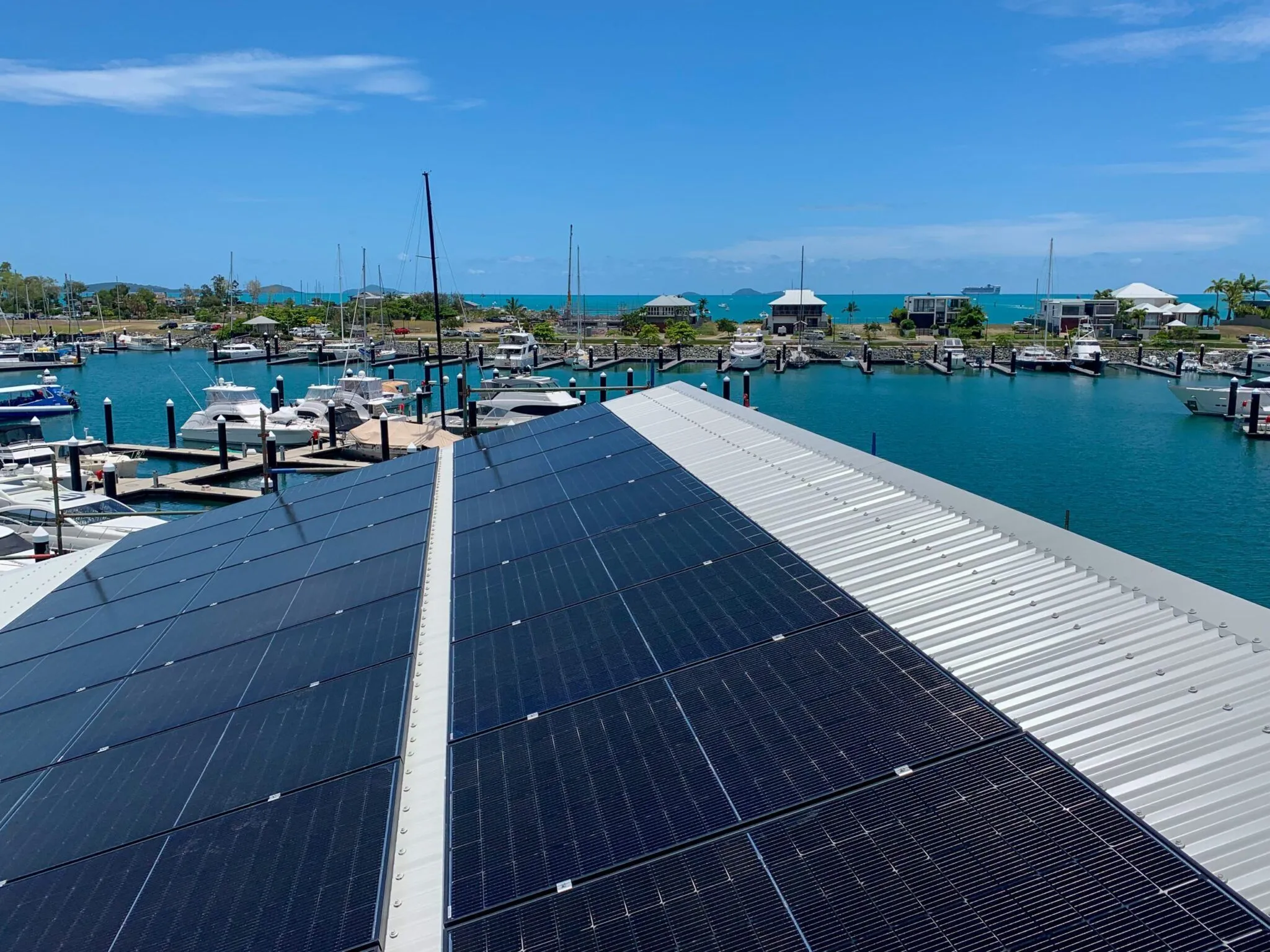 Green Energy Technologies Whitsundays - Solar panels installed on a metal roof at the marina, harnessing renewable energy