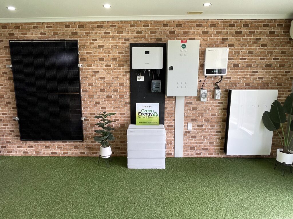 Green Energy Technologies Whitsundays Office at Unit 1/2 Myer Lasky Dr, Cannonvale QLD 4802. Showing solar inverters, batteries and meterbox in our showroom. Solar Power Whitsundays? We have you covered!